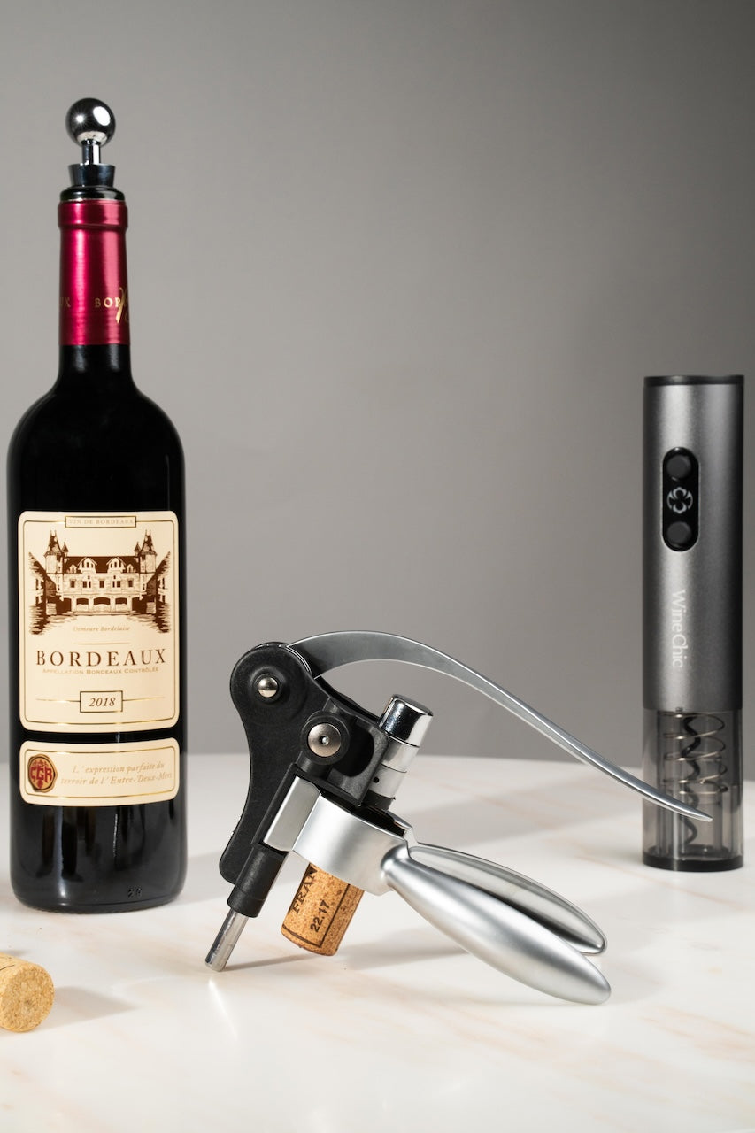 Levered Wine and Electric Wine Openers Opener with a bottle of wine