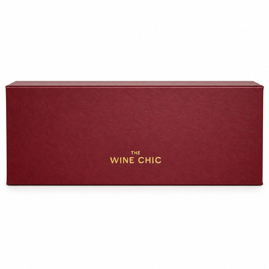 The Wine Chic Premium Wine Key in a closed burgundy gift box with gold logo